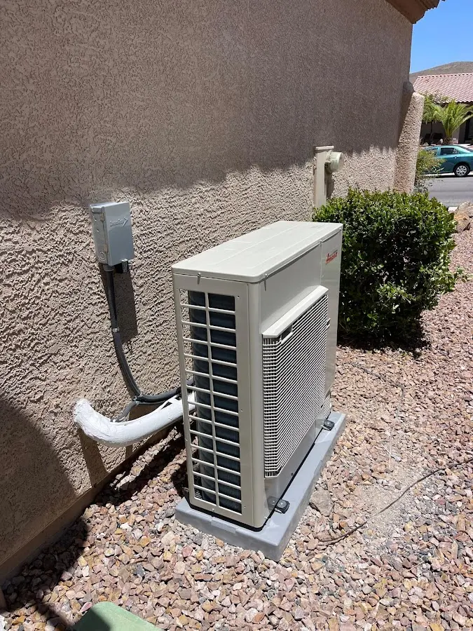 Residential air conditioning condenser unit in Rogers